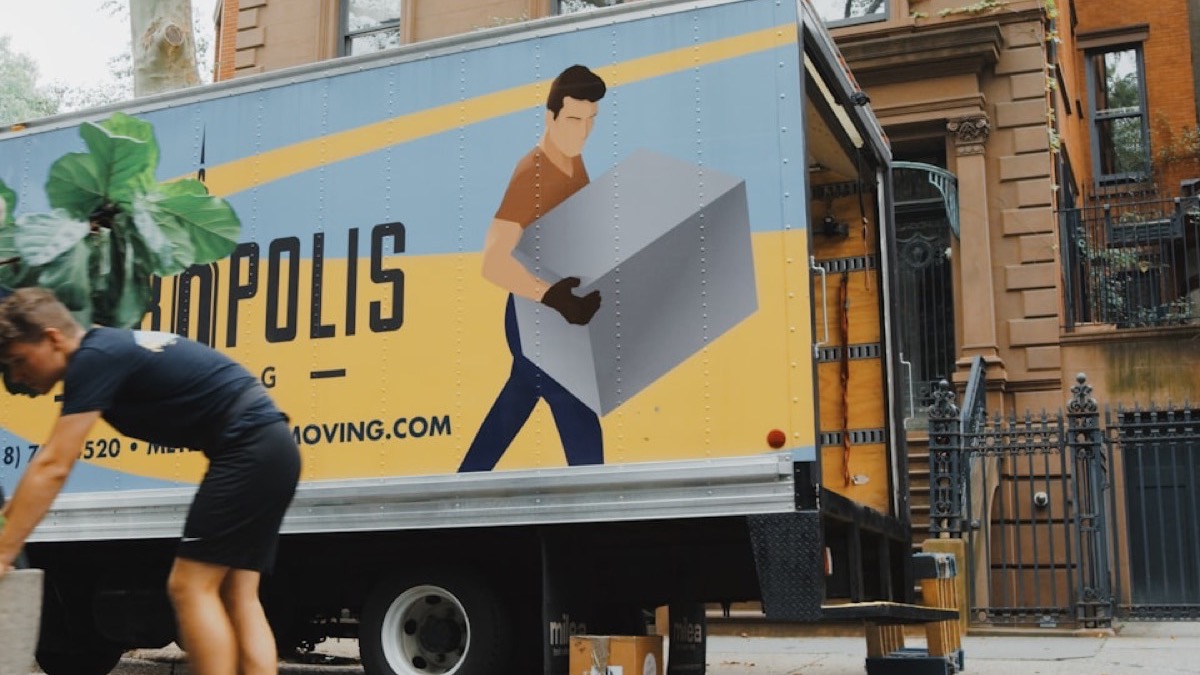 Boxes stacked by a doorway at move-out, when Arizona's deposit clock begins